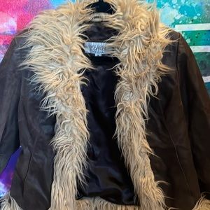 Authentic Wilson’s Leather women’s jacket. With faux fur trim.